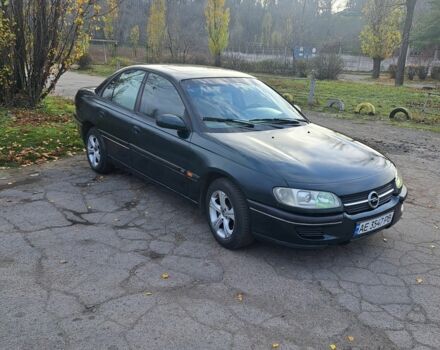 Зеленый Опель Омега, объемом двигателя 2 л и пробегом 280 тыс. км за 1950 $, фото 7 на Automoto.ua