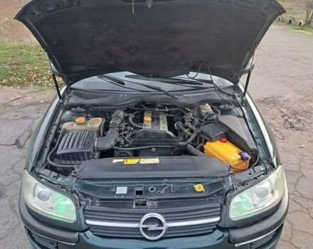 Зелений Опель Омега, об'ємом двигуна 2 л та пробігом 280 тис. км за 1899 $, фото 12 на Automoto.ua