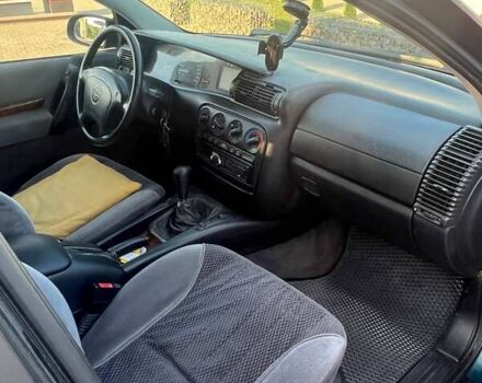 Зеленый Опель Омега, объемом двигателя 2 л и пробегом 190 тыс. км за 2200 $, фото 6 на Automoto.ua