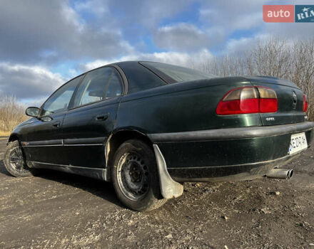 Зелений Опель Омега, об'ємом двигуна 2.96 л та пробігом 300 тис. км за 1350 $, фото 7 на Automoto.ua