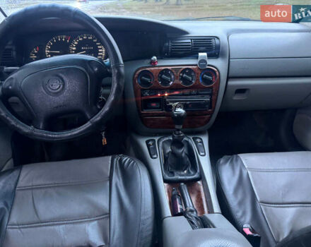 Зелений Опель Омега, об'ємом двигуна 2 л та пробігом 370 тис. км за 1250 $, фото 5 на Automoto.ua