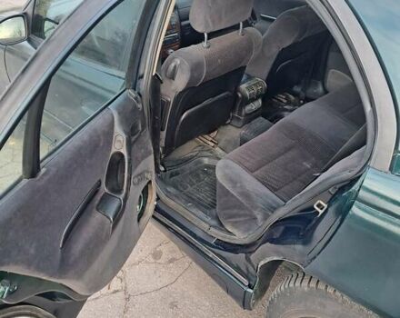 Зелений Опель Омега, об'ємом двигуна 2 л та пробігом 280 тис. км за 1899 $, фото 6 на Automoto.ua