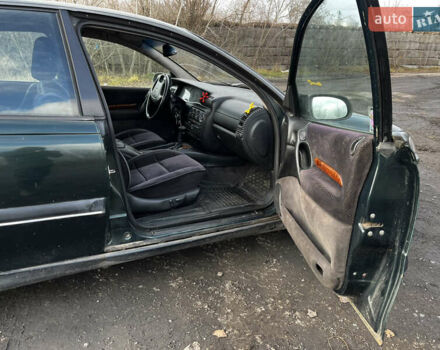 Зелений Опель Омега, об'ємом двигуна 2.96 л та пробігом 300 тис. км за 1350 $, фото 16 на Automoto.ua