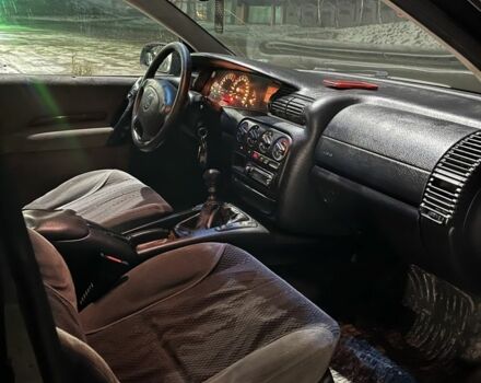 Зелений Опель Омега, об'ємом двигуна 2 л та пробігом 306 тис. км за 1450 $, фото 1 на Automoto.ua