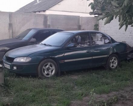 Зеленый Опель Омега, объемом двигателя 2 л и пробегом 340 тыс. км за 1200 $, фото 1 на Automoto.ua