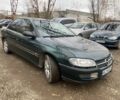 Зеленый Опель Омега, объемом двигателя 2 л и пробегом 200 тыс. км за 1300 $, фото 3 на Automoto.ua