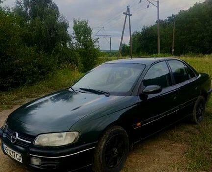 Зелений Опель Омега, об'ємом двигуна 2 л та пробігом 300 тис. км за 1000 $, фото 1 на Automoto.ua