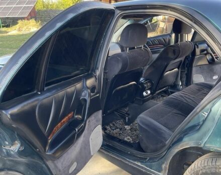 Зеленый Опель Омега, объемом двигателя 2 л и пробегом 300 тыс. км за 1800 $, фото 1 на Automoto.ua