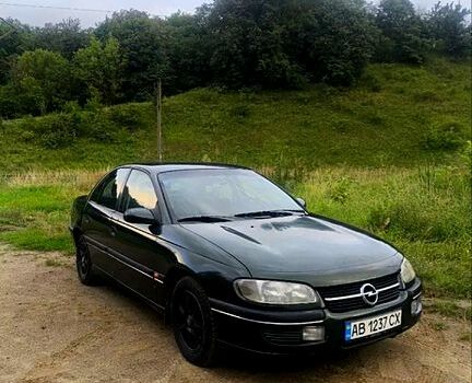 Зелений Опель Омега, об'ємом двигуна 2 л та пробігом 300 тис. км за 1000 $, фото 2 на Automoto.ua