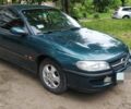 Зеленый Опель Омега, объемом двигателя 2 л и пробегом 350 тыс. км за 1650 $, фото 1 на Automoto.ua