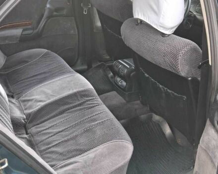 Зелений Опель Омега, об'ємом двигуна 2 л та пробігом 180 тис. км за 650 $, фото 8 на Automoto.ua