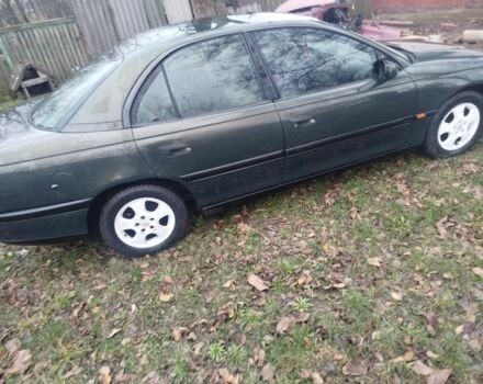 Зеленый Опель Омега, объемом двигателя 2 л и пробегом 355 тыс. км за 1300 $, фото 3 на Automoto.ua