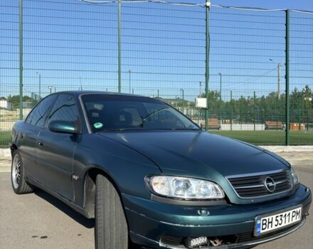 Зеленый Опель Омега, объемом двигателя 2.5 л и пробегом 300 тыс. км за 2500 $, фото 3 на Automoto.ua