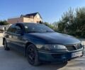 Зеленый Опель Омега, объемом двигателя 2 л и пробегом 300 тыс. км за 1800 $, фото 2 на Automoto.ua