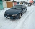 Зеленый Опель Омега, объемом двигателя 2 л и пробегом 400 тыс. км за 1750 $, фото 1 на Automoto.ua