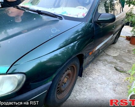 Зеленый Опель Омега, объемом двигателя 2 л и пробегом 250 тыс. км за 800 $, фото 2 на Automoto.ua