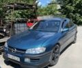 Зелений Опель Омега, об'ємом двигуна 2 л та пробігом 390 тис. км за 2300 $, фото 1 на Automoto.ua