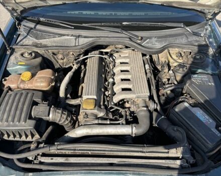 Зеленый Опель Омега, объемом двигателя 2.5 л и пробегом 300 тыс. км за 2500 $, фото 14 на Automoto.ua