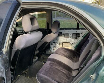 Зелений Опель Омега, об'ємом двигуна 2 л та пробігом 250 тис. км за 1300 $, фото 5 на Automoto.ua