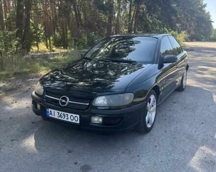 Зеленый Опель Омега, объемом двигателя 2 л и пробегом 305 тыс. км за 2200 $, фото 9 на Automoto.ua