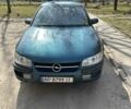 Зеленый Опель Омега, объемом двигателя 2 л и пробегом 302 тыс. км за 3000 $, фото 1 на Automoto.ua