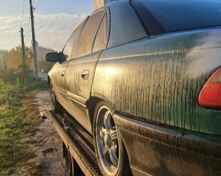 Зеленый Опель Омега, объемом двигателя 2 л и пробегом 390 тыс. км за 400 $, фото 6 на Automoto.ua