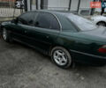 Зеленый Опель Омега, объемом двигателя 2 л и пробегом 350 тыс. км за 1500 $, фото 1 на Automoto.ua