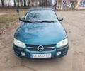 Зеленый Опель Омега, объемом двигателя 2 л и пробегом 350 тыс. км за 2100 $, фото 1 на Automoto.ua