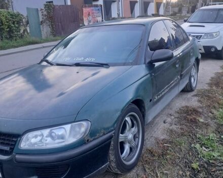 Зеленый Опель Омега, объемом двигателя 2 л и пробегом 390 тыс. км за 400 $, фото 4 на Automoto.ua