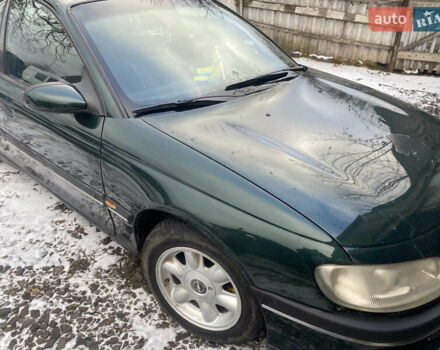 Зеленый Опель Омега, объемом двигателя 1.8 л и пробегом 100 тыс. км за 1750 $, фото 7 на Automoto.ua