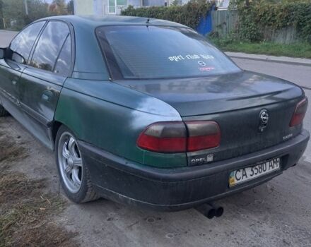 Зеленый Опель Омега, объемом двигателя 2 л и пробегом 390 тыс. км за 400 $, фото 2 на Automoto.ua