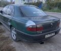 Зеленый Опель Омега, объемом двигателя 2 л и пробегом 390 тыс. км за 400 $, фото 2 на Automoto.ua