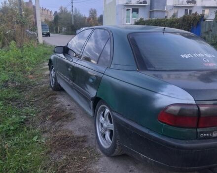Зеленый Опель Омега, объемом двигателя 2 л и пробегом 390 тыс. км за 400 $, фото 1 на Automoto.ua