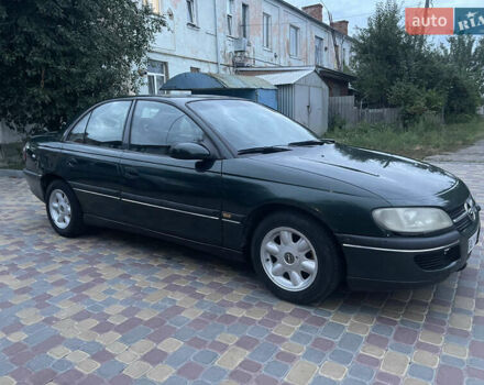 Зелений Опель Омега, об'ємом двигуна 1.8 л та пробігом 777 тис. км за 1200 $, фото 2 на Automoto.ua