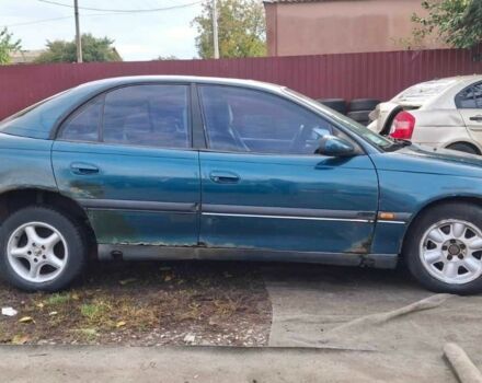 Зелений Опель Омега, об'ємом двигуна 2 л та пробігом 180 тис. км за 650 $, фото 2 на Automoto.ua