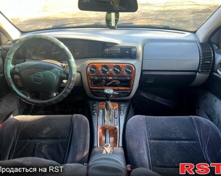 Зелений Опель Омега, об'ємом двигуна 2 л та пробігом 400 тис. км за 1700 $, фото 10 на Automoto.ua