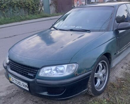 Зеленый Опель Омега, объемом двигателя 2 л и пробегом 390 тыс. км за 400 $, фото 5 на Automoto.ua