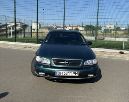 Зеленый Опель Омега, объемом двигателя 2.5 л и пробегом 300 тыс. км за 2500 $, фото 1 на Automoto.ua