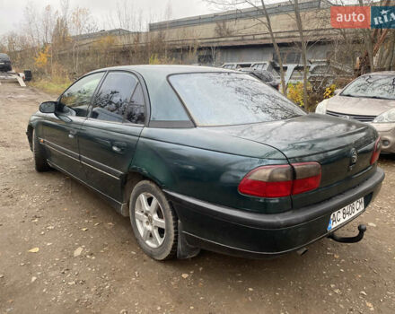 Зелений Опель Омега, об'ємом двигуна 2 л та пробігом 300 тис. км за 1300 $, фото 1 на Automoto.ua