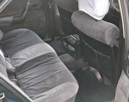 Зелений Опель Омега, об'ємом двигуна 2 л та пробігом 180 тис. км за 650 $, фото 8 на Automoto.ua