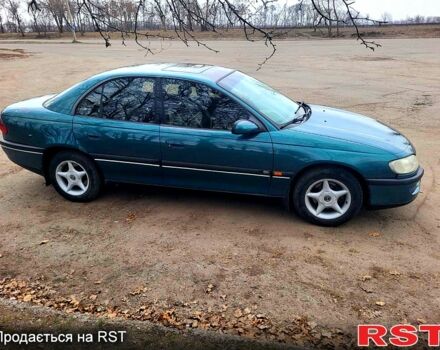 Зеленый Опель Омега, объемом двигателя 2 л и пробегом 350 тыс. км за 2100 $, фото 2 на Automoto.ua