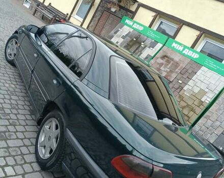 Зеленый Опель Омега, объемом двигателя 2.5 л и пробегом 400 тыс. км за 2150 $, фото 2 на Automoto.ua