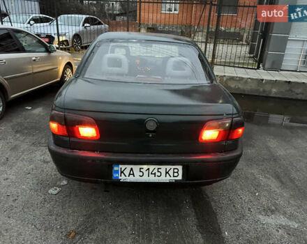 Зеленый Опель Омега, объемом двигателя 2 л и пробегом 350 тыс. км за 1500 $, фото 2 на Automoto.ua