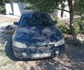 Зеленый Опель Омега, объемом двигателя 2 л и пробегом 350 тыс. км за 701 $, фото 1 на Automoto.ua