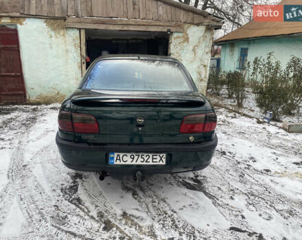 Зеленый Опель Омега, объемом двигателя 1.8 л и пробегом 100 тыс. км за 1750 $, фото 3 на Automoto.ua