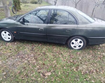 Зеленый Опель Омега, объемом двигателя 2 л и пробегом 355 тыс. км за 1300 $, фото 2 на Automoto.ua