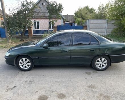 Зелений Опель Омега, об'ємом двигуна 2 л та пробігом 250 тис. км за 1300 $, фото 2 на Automoto.ua