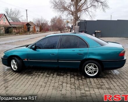 Зелений Опель Омега, об'ємом двигуна 2 л та пробігом 200 тис. км за 2700 $, фото 1 на Automoto.ua