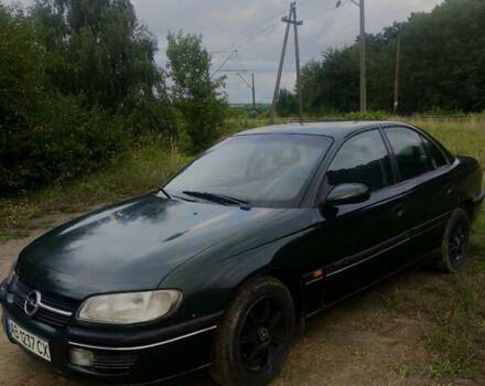 Зелений Опель Омега, об'ємом двигуна 2 л та пробігом 298 тис. км за 1600 $, фото 4 на Automoto.ua