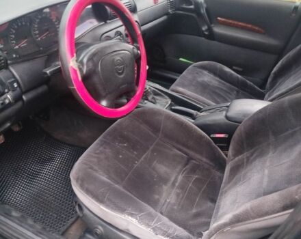 Зеленый Опель Омега, объемом двигателя 2 л и пробегом 355 тыс. км за 1300 $, фото 5 на Automoto.ua